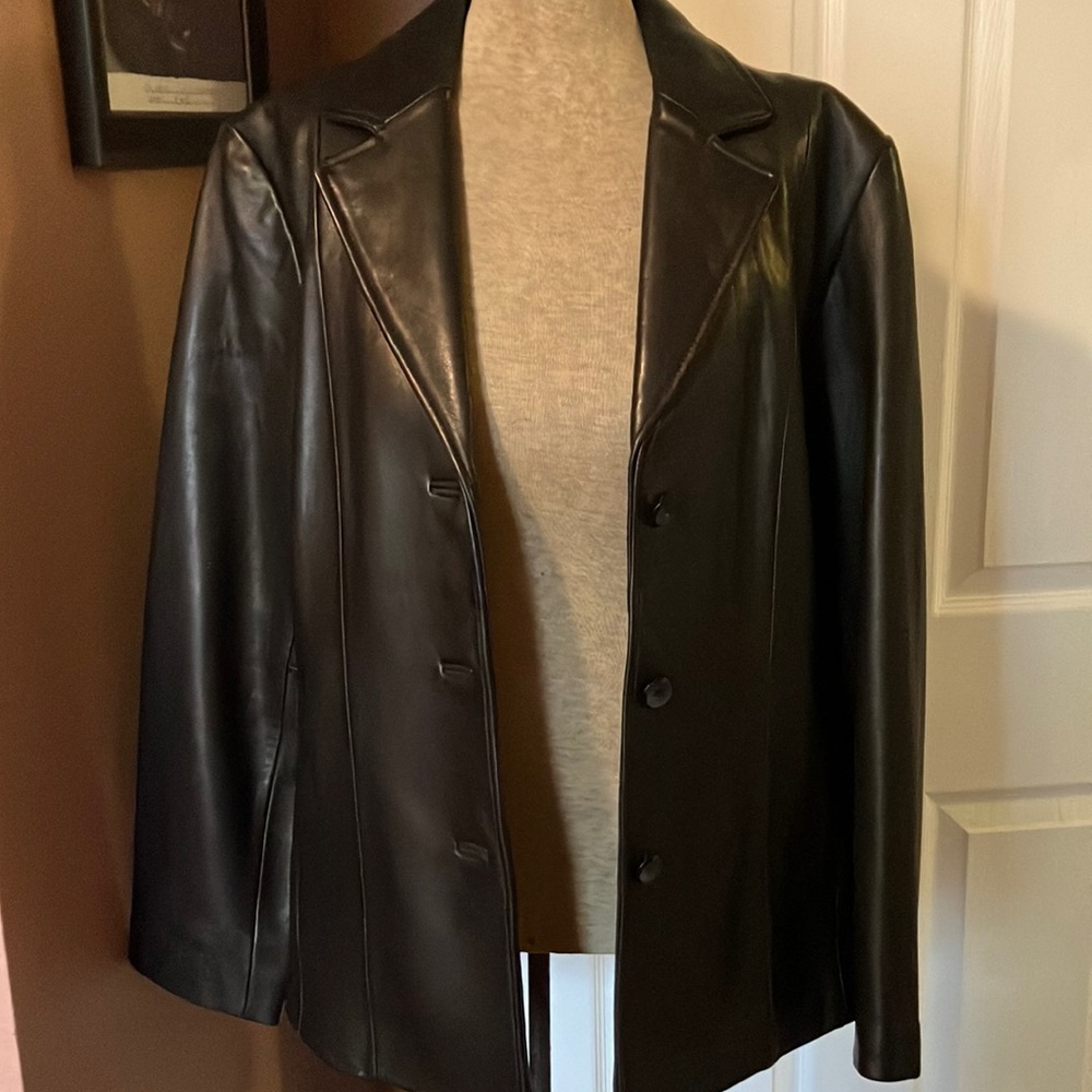 Dark brown leather jacket by SIENA size 12. Soft leather, like new.
